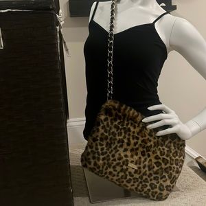 Kate Spades the cats meow vintage muff and Crossbody leopard handbag